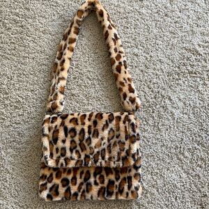 Cheetah print fur purse. New, super cute!! magnetic closure.